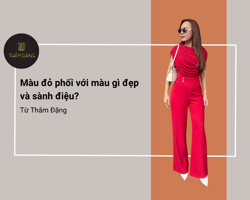 Một người phụ nữ thanh lịch trong bộ trang phục ton sur ton màu đỏ đô dự tiệc, toát lên vẻ quyến rũ và quyền lực, thể hiện sự lựa chọn màu sắc táo bạo nhưng tinh tế.